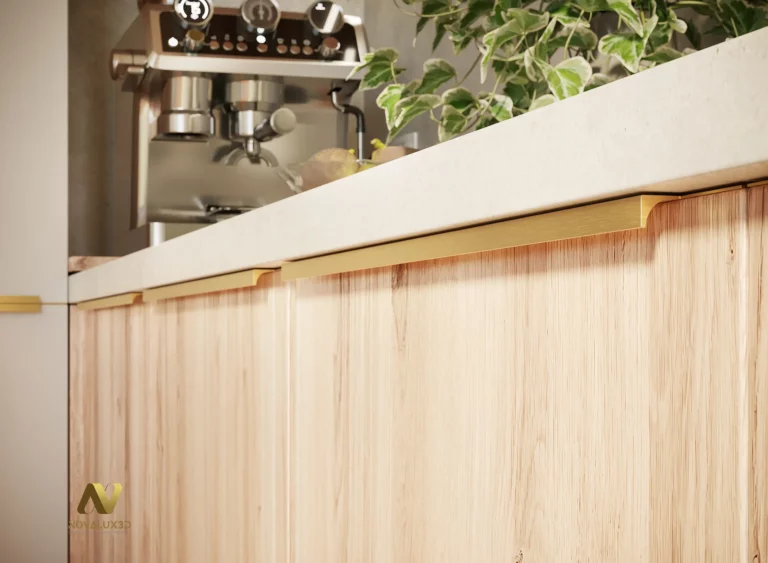 Gros plan photoréaliste sur une façade bois clair de cuisine avec poignée laiton, plan de travail blanc et profondeur de champ avec coin café en arrière-plan.